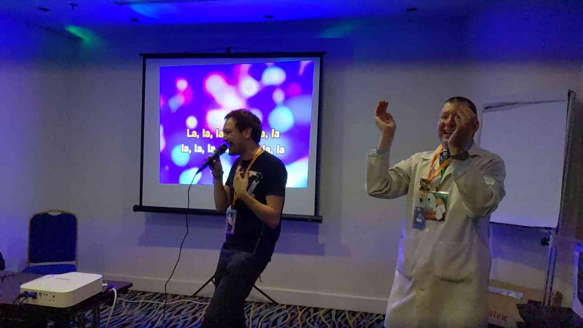 Kage and Fox Amoore doing karaoke at the con